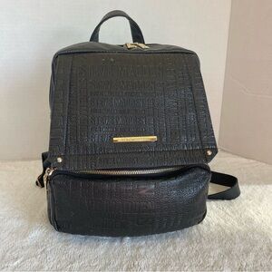 Steve Madded B Tampa Embossed mini backpack with gold zippers.